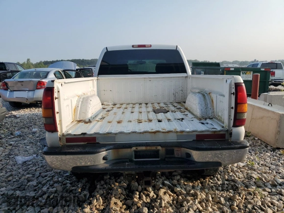 2002 GMC Sierra 1500HD SLE z VIN 1GTGK13U22F137583, wystawiony jako Copart lot #65997484 z przebiegiem 399 610 mil mil oraz Tytuł czysty. Historia ofert i sprzedaży dostępna na DreamBid. Obrazek 6.