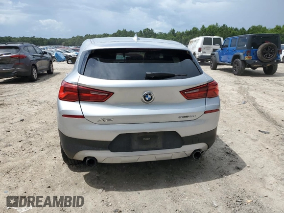 2018 BMW X2 sDrive28i with VIN WBXYJ3C39JEJ82814, listed as a Copart auction lot 59498615 with 74,550 mi miles and Salvage title. Bid and sale history available at DreamBid. Image 6.