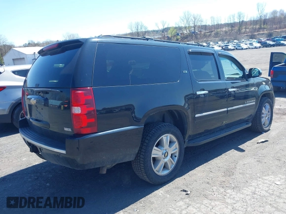 2009 Chevrolet Suburban LTZ with VIN 1GNFK36399J124158, listed as a IAAI auction lot 42063097 with 204,856 mi miles. Bid and sale history available at carsss.com. Image 4.
