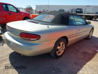 1999 Chrysler Sebring JXi with VIN 3C3EL55H6XT603058, listed as a IAAI auction lot 41998553 with 157,872 mi miles and . Bid and sale history available at DreamBid. Image 4.