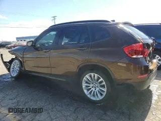 2014 BMW X1 sDrive28i z VIN WBAVM1C57EVW53696, wystawiony jako Copart lot #53142255 z przebiegiem 86 581 mil mil oraz Czysty tytuł • Clean title. Historia ofert i sprzedaży dostępna na DreamBid. Obrazek 2.