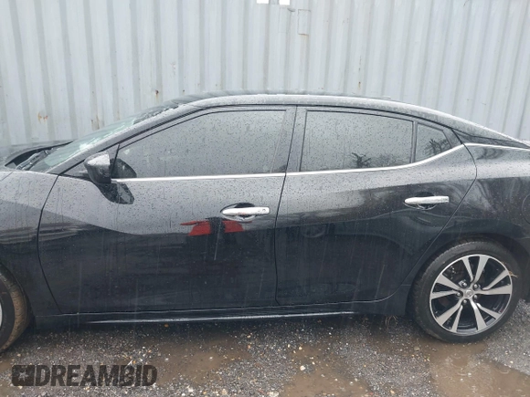 2018 Nissan Maxima S with VIN 1N4AA6AP8JC361269, listed as a IAAI auction lot 42005790 with 110,580 mi miles and . Bid and sale history available at DreamBid. Image 14.