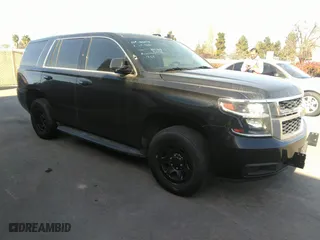 2017 Chevrolet Tahoe Commercial with VIN 1GNLCDEC0HR223538, listed as a IAAI auction lot 41501555 with 105,031 mi miles. Bid and sale history available at carsss.com. Image 1.