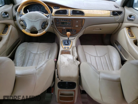 2000 Jaguar S-Type V6 z VIN SAJDA01C0YFL51640, wystawiony jako Copart lot #48708915 z przebiegiem 186 034 mil mil oraz Nie do naprawy • Non repairable. Historia ofert i sprzedaży dostępna na DreamBid. Obrazek 8.