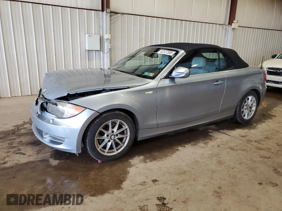 2011 BMW 1 Series 128i with VIN WBAUL7C57BVM80274, listed as a Copart auction lot 52127595 with 104,952 mi miles and Salvage title. Bid and sale history available at DreamBid. Image 1.