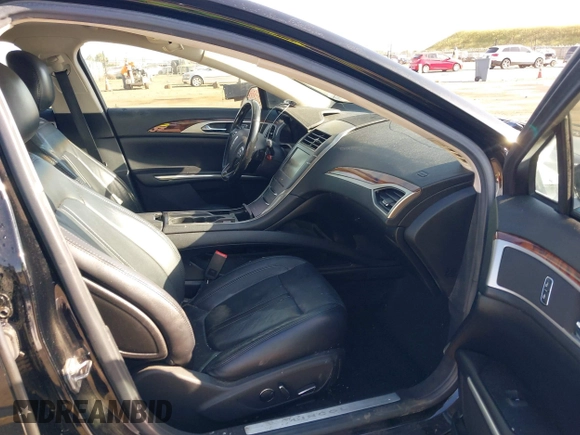2016 Lincoln MKZ with VIN 3LN6L2G95GR632533, listed as a IAAI auction lot 42099399 with 131,639 mi miles and . Bid and sale history available at DreamBid. Image 5.