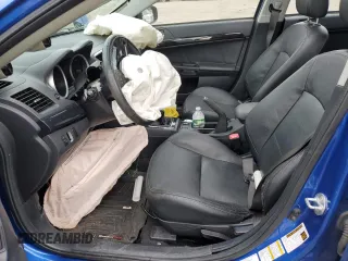 2015 Mitsubishi Lancer Evolution GSR z VIN JA32W8FV7FU023106, wystawiony jako Copart lot #40867084 z przebiegiem 103 964 mil mil oraz Szkody całkowita. Historia ofert i sprzedaży dostępna na DreamBid. Obrazek 7.