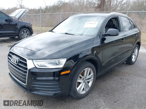 2018 Audi Q3 Premium z VIN WA1BCCFS8JR013032, wystawiony jako IAAI lot #41706173 z przebiegiem 111 402 mil mil oraz . Historia ofert i sprzedaży dostępna na DreamBid. Obrazek 2.