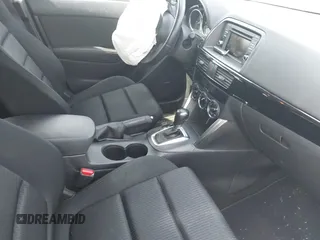 2015 Mazda CX-5 Touring with VIN JM3KE2CY2F0530204, listed as a IAAI auction lot 41788921 with 50,827 mi miles. Bid and sale history available at carsss.com. Image 5.