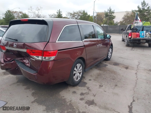 2016 Honda Odyssey SE with VIN 5FNRL5H38GB094778, listed as a IAAI auction lot 41740339 with 103,656 mi miles. Bid and sale history available at carsss.com. Image 4.