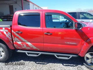 2014 Toyota Tacoma with VIN 5TFLU4EN4EX095917, listed as a IAAI auction lot 41820691 with 59,823 mi miles and . Bid and sale history available at DreamBid. Image 13.