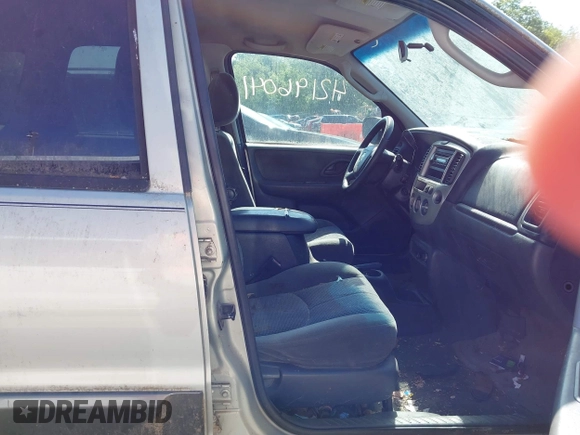 2003 Mazda Tribute LX with VIN 4F2YZ04113KM46727, listed as a IAAI auction lot 42196041 with Not Provided miles and . Bid and sale history available at DreamBid. Image 5.