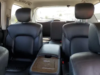 2016 Infiniti QX80 with VIN JN8AZ2NEXG9125401, listed as a Copart auction lot 65924664 with 138,858 mi miles and Salvage Title. Bid and sale history available at carsss.com. Image 10.