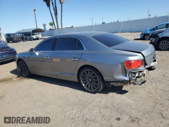 2014 Bentley Flying Spur с VIN SCBEC9ZA7EC090575, выставлен на аукционе Copart как лот 57110315 с пробегом 19 083 миль миль и Списание • Salvage title. История ставок и продаж доступна на DreamBid. Изображение 2.