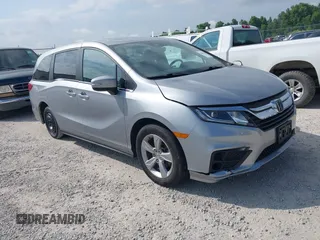 2019 Honda Odyssey EX-L z VIN 5FNRL6H77KB003095, wystawiony jako IAAI lot #42441199 z przebiegiem 90 249 mil mil oraz . Historia ofert i sprzedaży dostępna na DreamBid. Obrazek 1.