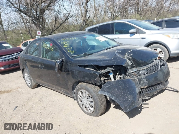 2011 Kia Forte EX with VIN KNAFU4A22B5459846, listed as a IAAI auction lot 39011262 with 201,154 mi miles. Bid and sale history available at carsss.com. Image 1.