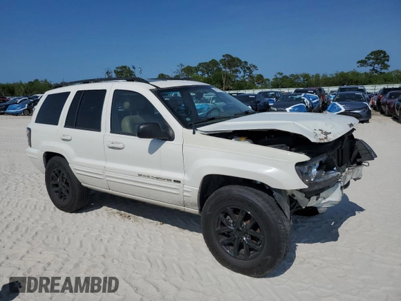 2002 Jeep Grand Cherokee Limited with VIN 1J4GX58S52C121941, listed as a Copart auction lot 55472015 with 182,225 mi miles and Salvage Title. Bid and sale history available at DreamBid. Image 4.