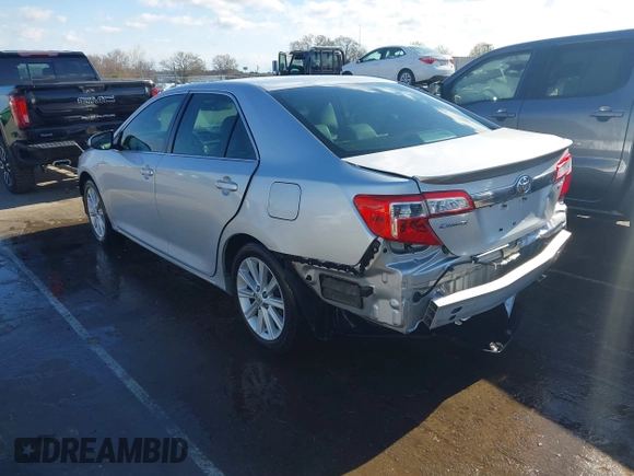 2014 Toyota Camry L with VIN 4T1BF1FK4EU338230, listed as a IAAI auction lot 41797002 with 162,611 mi miles. Bid and sale history available at carsss.com. Image 3.