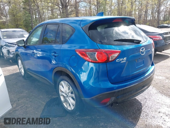 2013 Mazda CX-5 Grand Touring with VIN JM3KE4DE4D0123837, listed as a IAAI auction lot 42031074 with 121,818 mi miles. Bid and sale history available at carsss.com. Image 3.