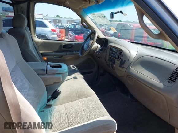 2001 Ford F-150 z VIN 1FTPX17LX1KB15016, wystawiony jako IAAI lot #42320637 z przebiegiem 567 424 mil mil oraz . Historia ofert i sprzedaży dostępna na DreamBid. Obrazek 5.