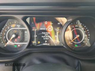 2024 Jeep Wrangler Sahara with VIN 1C4PJXEN7RW297948, listed as a Copart auction lot 54656795 with 12,292 mi miles and Salvage title. Bid and sale history available at DreamBid. Image 9.