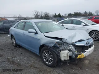 2010 Toyota Camry Hybrid with VIN 4T1BB3EK6AU125315, listed as a IAAI auction lot 41552627 with 104,538 mi miles. Bid and sale history available at carsss.com. Image 1.