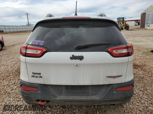 2014 Jeep Cherokee Trailhawk with VIN 1C4PJMBS7EW183855, listed as a Copart auction lot 46143085 with 146,901 mi miles and Salvage Title. Bid and sale history available at DreamBid. Image 6.