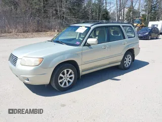 2007 Subaru Forester X w/Premium Pkg with VIN JF1SG65627H719188, listed as a IAAI auction lot 42074029 with 191,763 mi miles. Bid and sale history available at carsss.com. Image 2.