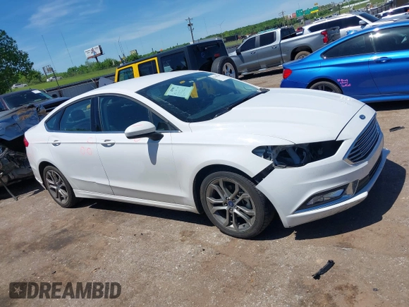 2017 Ford Fusion SE z VIN 3FA6P0H90HR246900, wystawiony jako IAAI lot #42169109 z przebiegiem 178 878 mil mil oraz . Historia ofert i sprzedaży dostępna na DreamBid. Obrazek 14.