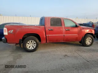 2006 Mitsubishi Raider LS z VIN 1Z7HT28K56S574705, wystawiony jako Copart lot #82250434 z przebiegiem 133 736 mil mil oraz Szkoda całkowita • Salvage title. Historia ofert i sprzedaży dostępna na DreamBid. Obrazek 3.