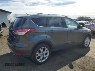 2016 Ford Escape Titanium with VIN 1FMCU9JX2GUC48038, listed as a Copart auction lot 49788615 with 198,727 mi miles and Clean Title. Bid and sale history available at carsss.com. Image 3.