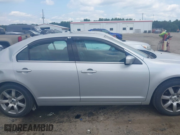 2010 Mercury Milan Premier z VIN 3MEHM0JG6AR648087, wystawiony jako IAAI lot #42483325 z przebiegiem 202 019 mil mil oraz . Historia ofert i sprzedaży dostępna na DreamBid. Obrazek 13.