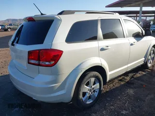 2014 Dodge Journey SE with VIN 3C4PDCAB4ET119412, listed as a IAAI auction lot 41760074 with 148,882 mi miles. Bid and sale history available at carsss.com. Image 4.