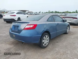 2007 Honda Civic Cpe LX with VIN 2HGFG12657H582102, listed as a IAAI auction lot 42030068 with 166,172 mi miles. Bid and sale history available at carsss.com. Image 4.