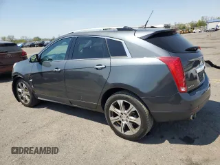 2012 Cadillac SRX Performance Collection with VIN 3GYFNEE34CS590058, listed as a Copart auction lot 54548545 with 122,070 mi miles and Salvage Title. Bid and sale history available at carsss.com. Image 2.