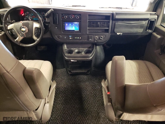 2016 Chevrolet Express Passenger LT with VIN 1GAWGFFFXG1284318, listed as a Copart auction lot 77784123 with 71,042 mi miles. Bid and sale history available at carsss.com. Image 8.