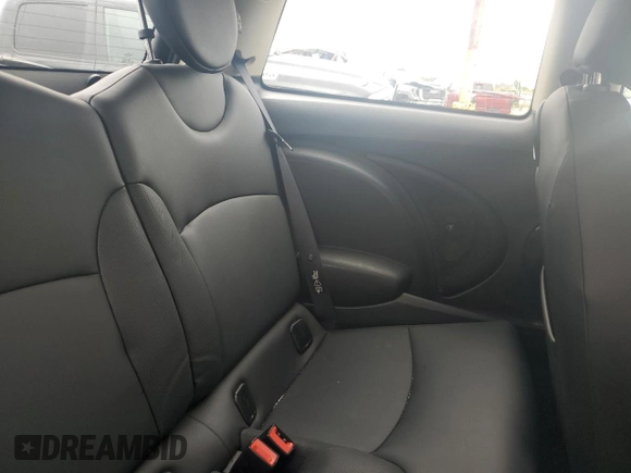 2011 MINI Hardtop S with VIN WMWSV3C58BTY11580, listed as a Copart auction lot 62081615 with 112,336 mi miles and Salvage title. Bid and sale history available at DreamBid. Image 10.