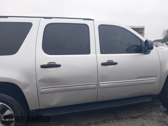 2010 Chevrolet Suburban LS with VIN 1GNUKHE37AR193670, listed as a IAAI auction lot 41415863 with 213,371 mi miles and . Bid and sale history available at DreamBid. Image 12.
