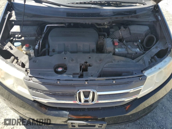 2012 Honda Odyssey Touring with VIN 5FNRL5H95CB004226, listed as a Copart auction lot 55775235 with 157,521 mi miles and Clean Title. Bid and sale history available at DreamBid. Image 12.