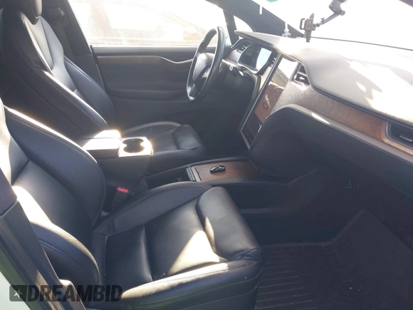 2021 Tesla Model X Long Range Plus with VIN 5YJXCDE29MF316169, listed as a IAAI auction lot 41232066 with 53,235 mi miles and . Bid and sale history available at carsss.com. Image 5.