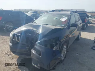 2015 Jeep Cherokee Latitude with VIN 1C4PJLCB9FW683459, listed as a IAAI auction lot 41998309 with 176,769 mi miles and . Bid and sale history available at carsss.com. Image 17.