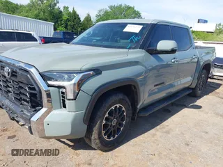2022 Toyota Tundra SR5 with VIN 5TFLA5AB7NX013477, listed as a IAAI auction lot 42172272 with 30,460 mi miles and . Bid and sale history available at DreamBid. Image 2.