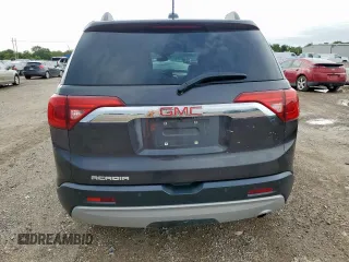2018 GMC Acadia SLT with VIN 1GKKNMLAXJZ211715, listed as a Copart auction lot 61094385 with 106,929 mi miles and Salvage title. Bid and sale history available at DreamBid. Image 6.