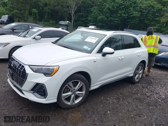 2020 Audi Q3 S line Premium with VIN WA1DECF30L1115390, listed as a IAAI auction lot 42503728 with 18,556 mi miles and . Bid and sale history available at DreamBid. Image 14.