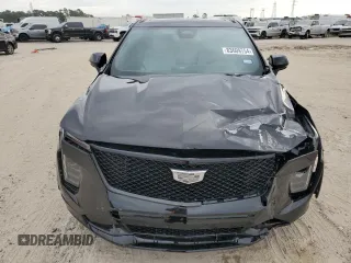 2024 Cadillac XT4 FWD Sport with VIN 1GYFZER46RF213543, listed as a Copart auction lot 83609754 with 3,878 mi miles and Salvage title. Bid and sale history available at DreamBid. Image 5.