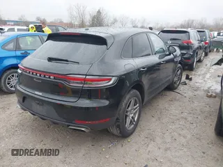 2020 Porsche Macan with VIN WP1AA2A51LLB03131, listed as a IAAI auction lot 40811412 with 59,590 mi miles and . Bid and sale history available at DreamBid. Image 4.