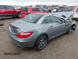 2014 Mercedes-Benz SLK 250 with VIN WDDPK4HA6EF084283, listed as a IAAI auction lot 41927893 with 32,143 mi miles and . Bid and sale history available at DreamBid. Image 4.
