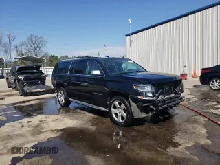 2015 Chevrolet Suburban LTZ with VIN 1GNSKKKC2FR210780, listed as a Copart auction lot 47207445 with 163,448 mi miles and Salvage Title. Bid and sale history available at carsss.com. Image 15.