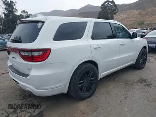 2019 Dodge Durango GT Plus with VIN 1C4RDHDGXKC650747, listed as a IAAI auction lot 42556068 with 141,830 mi miles and . Bid and sale history available at DreamBid. Image 4.