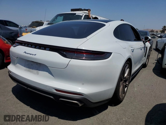 2021 Porsche Panamera с VIN WP0AJ2A72ML115633, выставлен на аукционе Copart как лот 62893184 с пробегом 32 883 миль миль и Списание • Salvage title. История ставок и продаж доступна на DreamBid. Изображение 3.